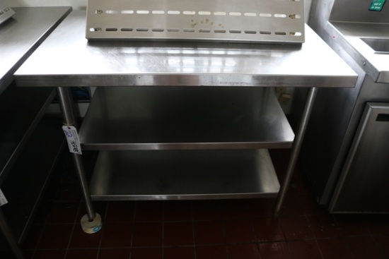 30" x 48" stainless table with double stainless under shelves - good table