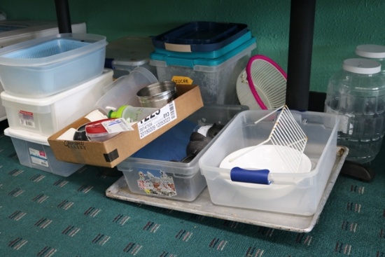 Misc. under table - Tupperware/racks/pans