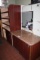 Times 2 cherry finish base cabinets with brown marble formica top