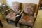 Pair of padded high back arm chairs