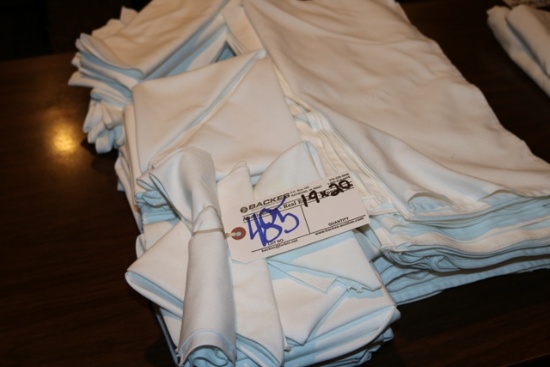 Pile of white cloth dinner napkins