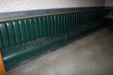 Approx. 20' Hunter green vinyl wall seating - some rips & cracks on seats