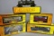 Times 5 - Rail King freight cars - Army caboose 30-77045, flat car with roc