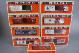 Times 8 - Lionel Holiday box cars - 19903, 19910, 19920, 19921, 19945, 1654