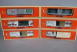 Times 6 - Lionel Xmas box cars - 16272, 16273, 16776, 19855, 19946
