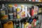 Shelf of open automotive oils & supplies