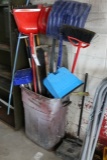 Barrel with brooms & shovels
