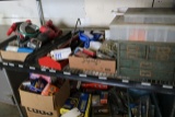 Shelf of assorted tools, saws, tool kits