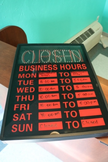 Lighted OPEN sign with hour display