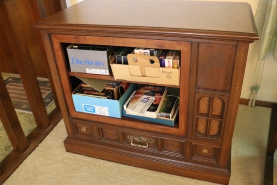 TV stand with VCR tapes