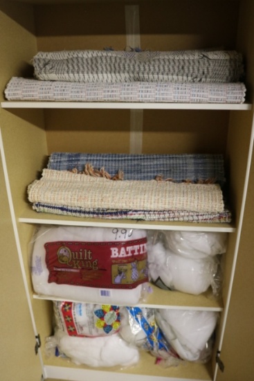 30" x 60" white cabinet with rag rugs & batting