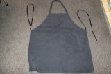 2 Boxes of black aprons
