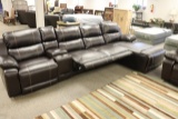 Brown leather sectional with recliner