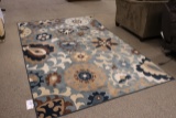 7' x 10' Area rug with stains