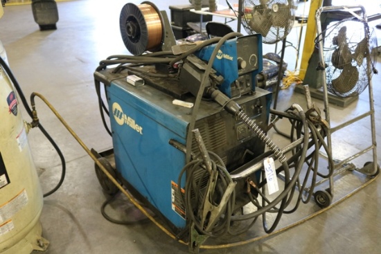 Miller CP302 power source welder with 70 series wire feed - with cart - 3 p