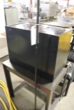 Metal file cabinet, floor lamp, wood table