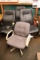 5 office chairs with 3 desks