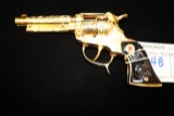 Hubley Texan cap gun gold