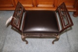 Wrought iron padded bench