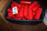 Tote of used ketchup squirts - w/ some lids