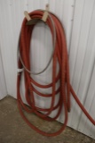 Pair of garden hoses to go - red hose is very nice