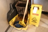 Mop bucket , wet floor sign