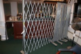 Approximately 30’ long Illinois Engineer accordion security gate - nice