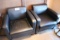 Times 2 - Black vinyl lounge chairs