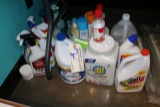 Assorted opened cleaning supplies & sprays