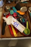 Box of cookie cutters, measuring cups & spoons, bowl scrapers