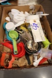 Box of cookie cutters, measuring cups & spoons, bowl scrapers