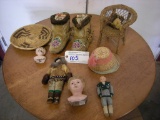 All to go  Moccasins, doll heads and wicker chair