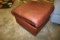 Brown vinyl portable ottoman missing one roller - 24 x 24