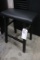 Black padded bar stool