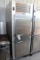 Traulsen stainless 2 split door cooler w/ 2 interior racks