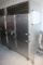 Traulsen stainless 4 split door freezer w/ racks
