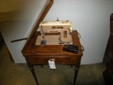 Singer Sewing Machine with Cabinet