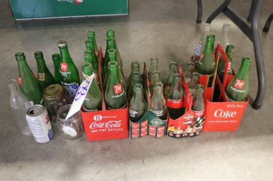 Coke, 7up bottles, Pepsi can, misc