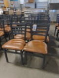 Times 10 - Black metal framed ladder back brown padded vinyl dinning chairs