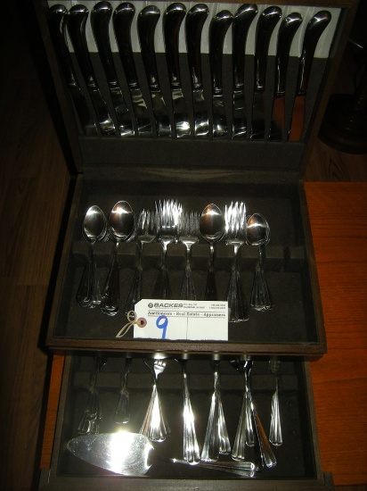 12 place International stainless flatware with additional pieces