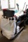 Forbes Maids cart with room inventory and two vacuums