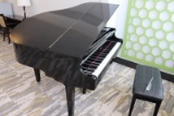 Howard baby grand piano in excellent condition