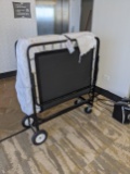 Portable roll away bed