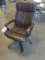 Brown leather style swivel office chair - nice condition