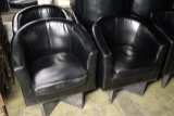 Times 17 - Black leather barrel lounge chairs - minor Knicks & tears