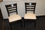 Times 24 - Black wood framed ladder back dining chairs with tan vinyl seats