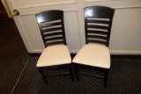Times 22 - Black wood framed ladder back dining chairs with tan vinyl seats