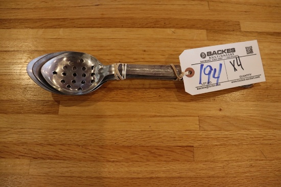 Times 4 - perforated stainless service spoons