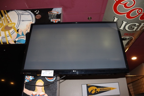 LG 50" TV with wall mount bracket