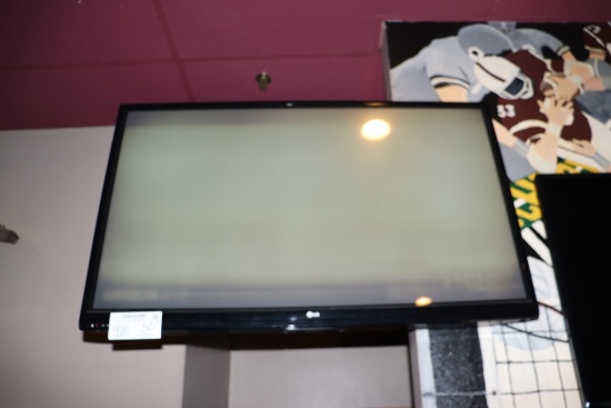 LG 50" TV with wall mount bracket